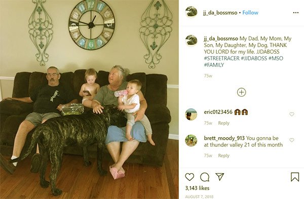 Image of Caption: JJ Da Boss shared a photo of his parents, kids, and dog on his Instagram