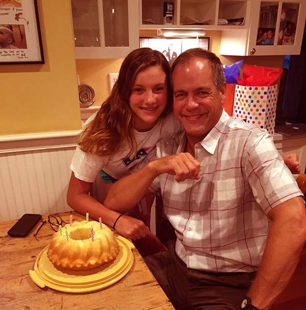 Image of Caption: Robert Kulp celebrating his birthday with his daughter
