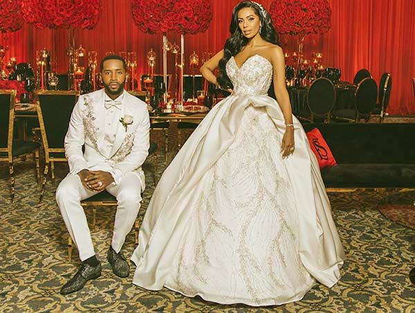 Image of Caption: Erica Mena engaged with her new boyfriend Safaree Samuels