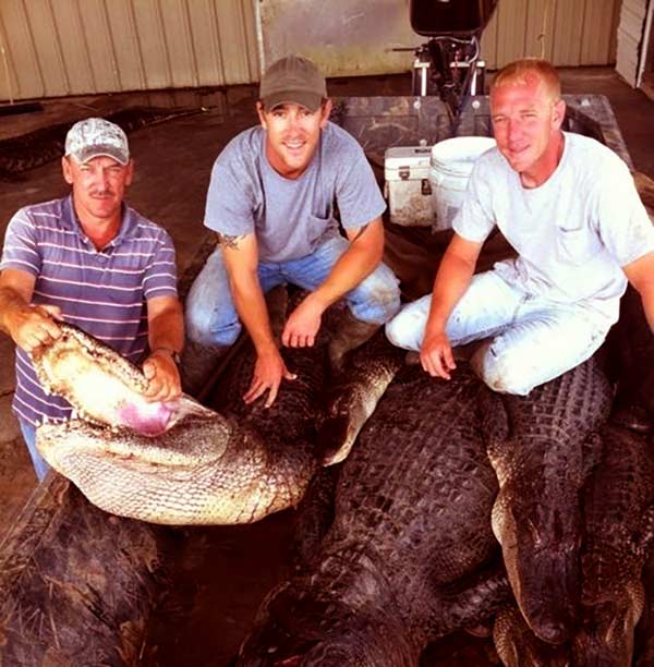 Image of Caption: Troy Landry, Jacob and Chase Landry