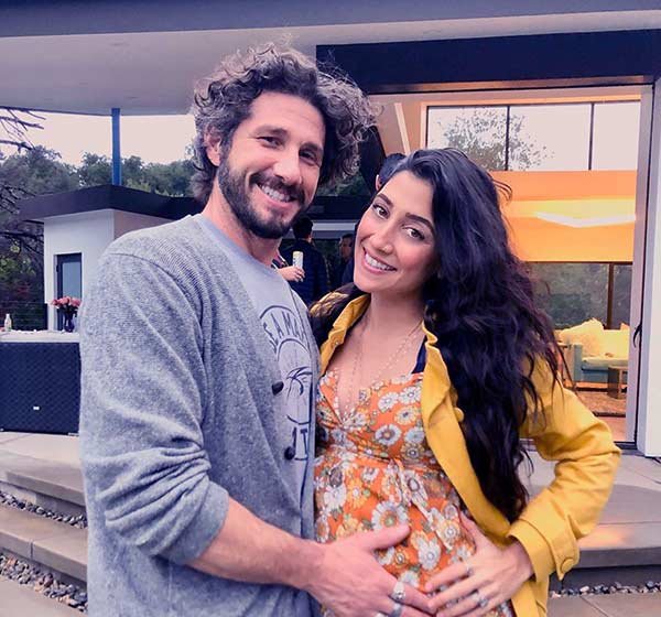 Image of Will Willis with wife Krystle Amina during her pregnancy
